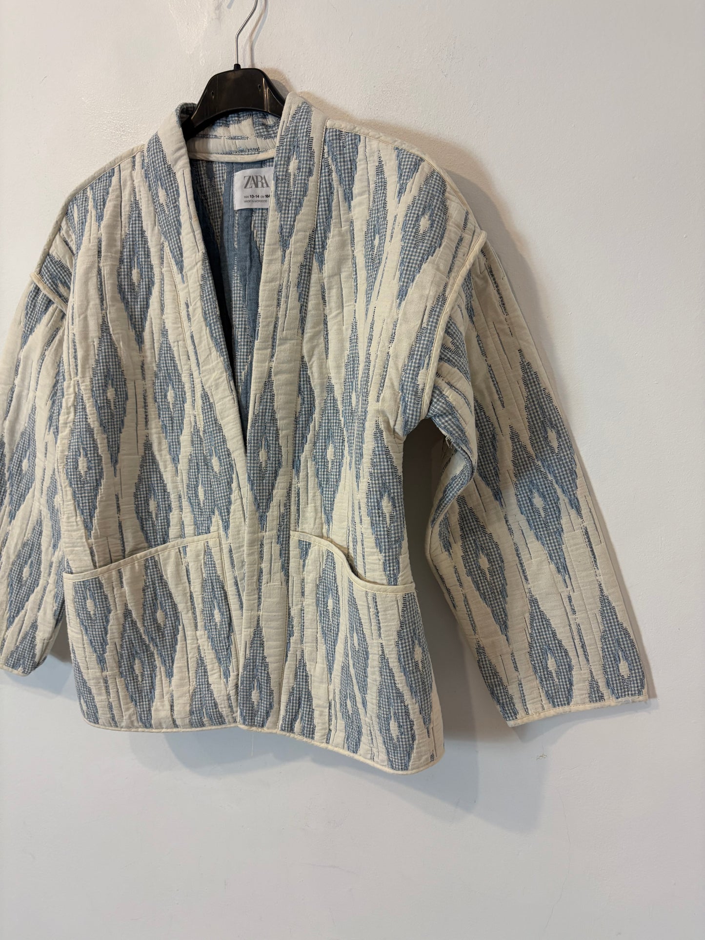 ZARA. Chaqueta azul claro textura