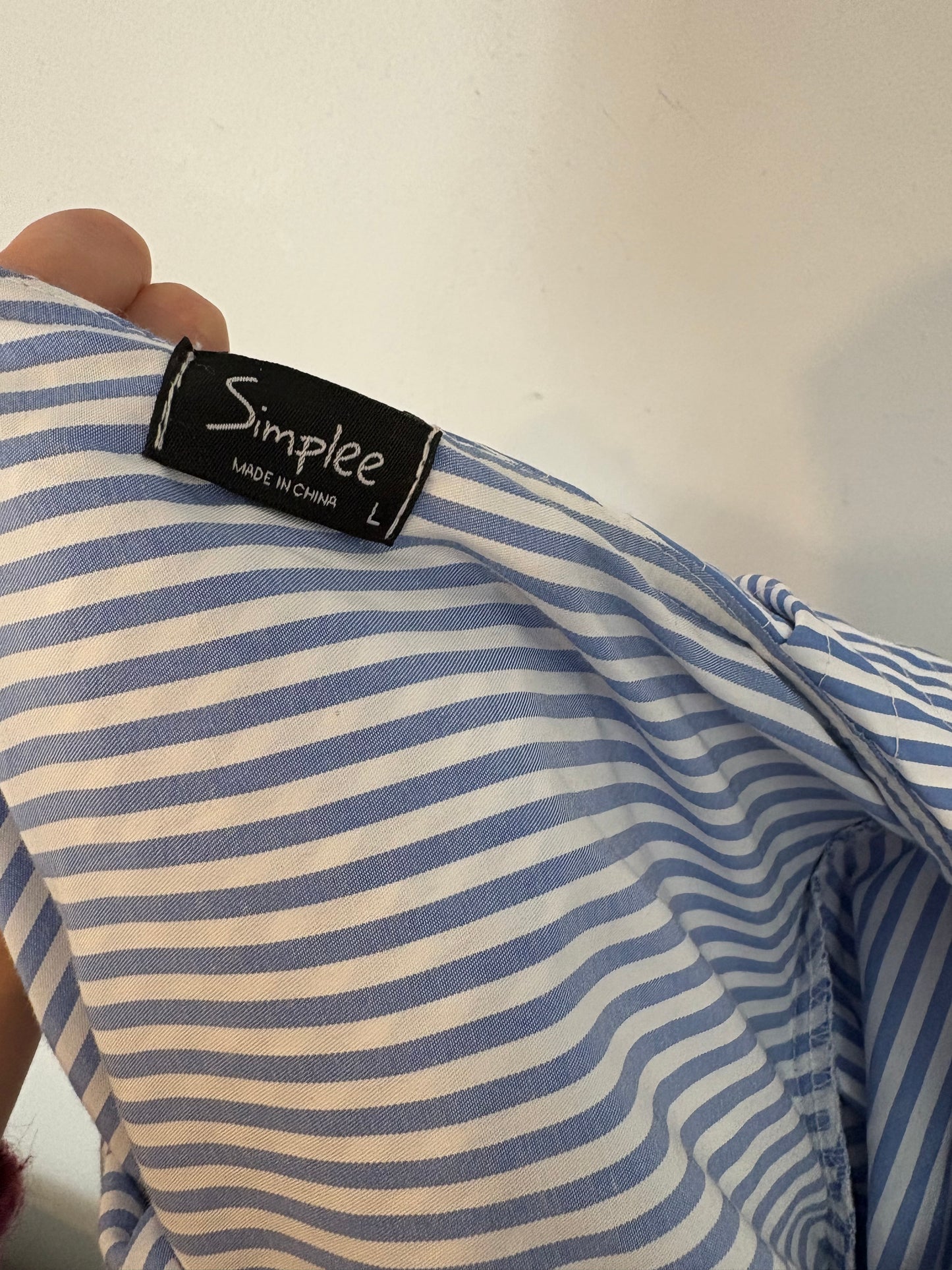 OTRAS. Blusa rayas volantes