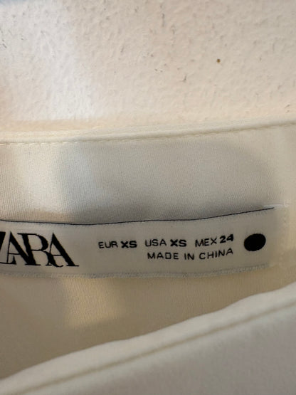 ZARA. Falda larga flecos