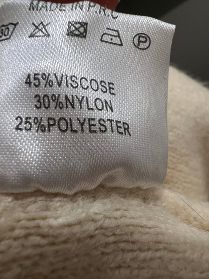 TERIA YABAR. Jersey beige volante T.m