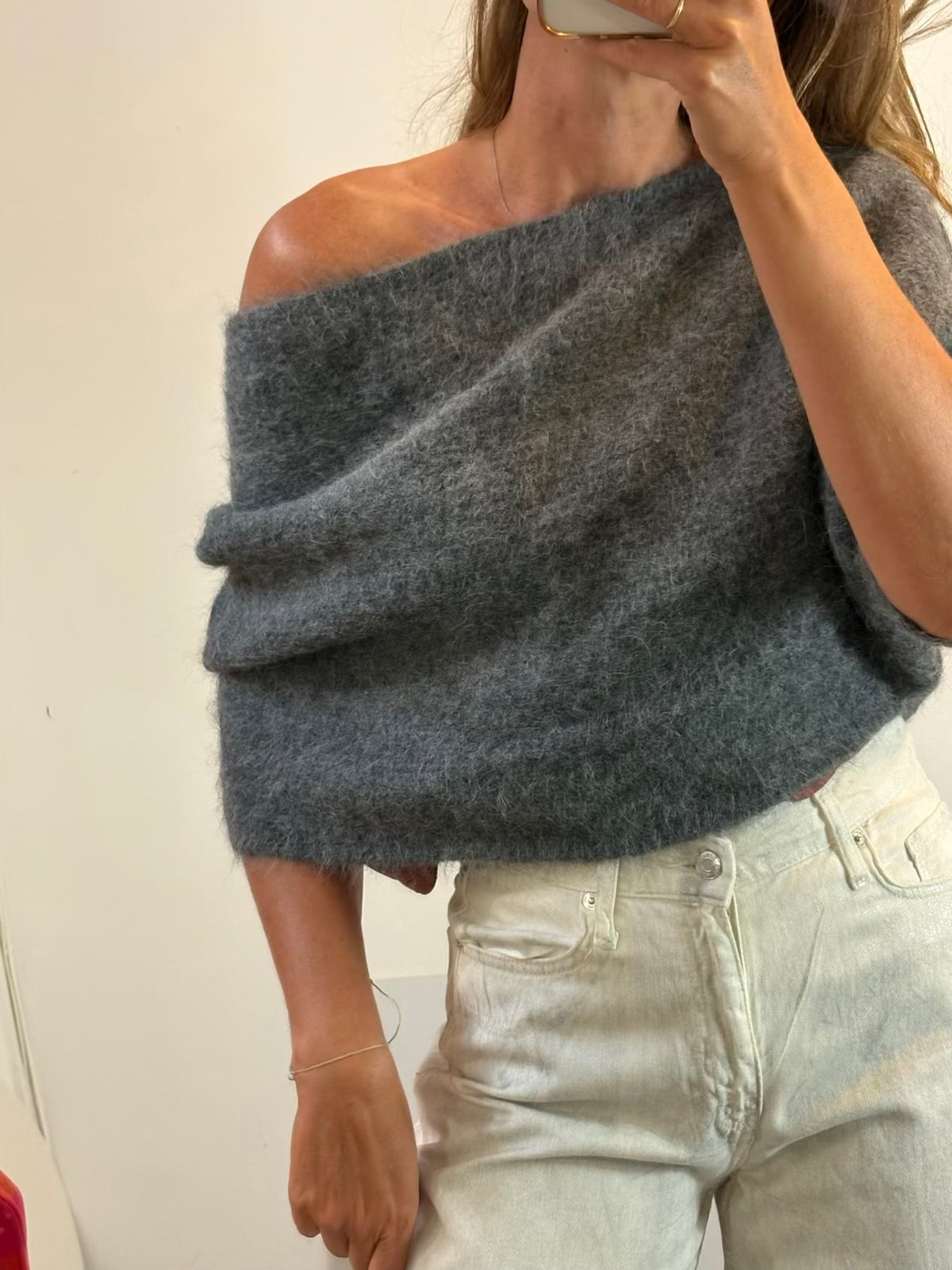 ZARA. Jersey asimétrico gris con alpaca