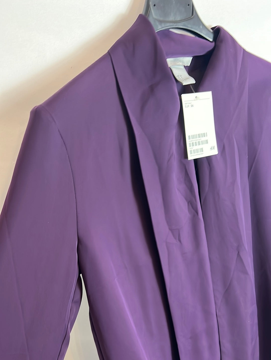 H&M. Blusa morada lazada. T 36