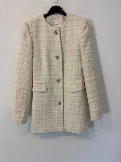 ZARA. Chaqueta tweed blanca