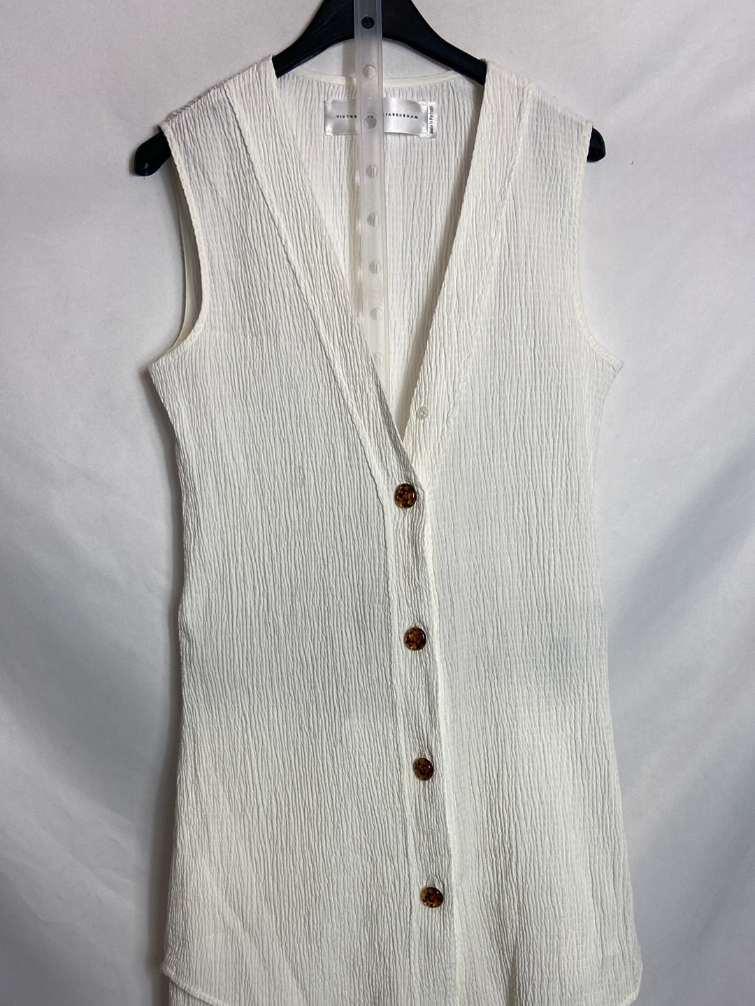 VICTORIA BECKHAM. Total look blanco textura T.36