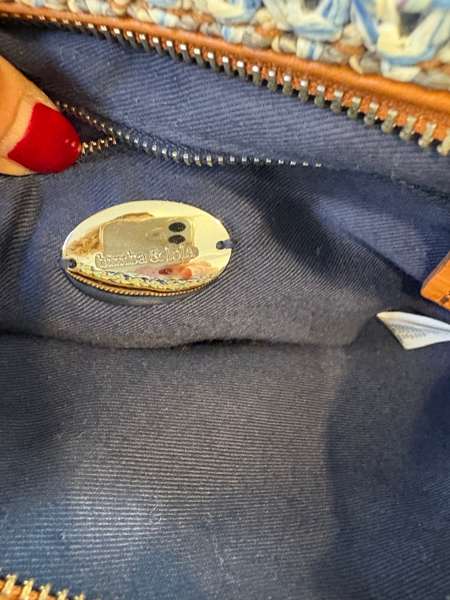 BIMBA Y LOLA. Bolso trenzado tonos azules