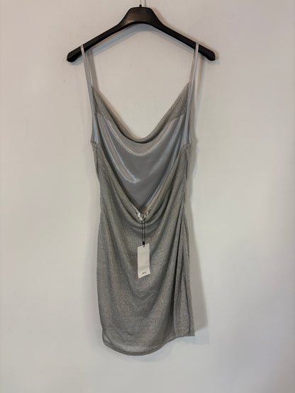 MASSIMO DUTTI. Short green skirt with pocket T.xs