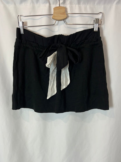 SANDRO. Short black skirt with bow detail. Size 3 (M/L)