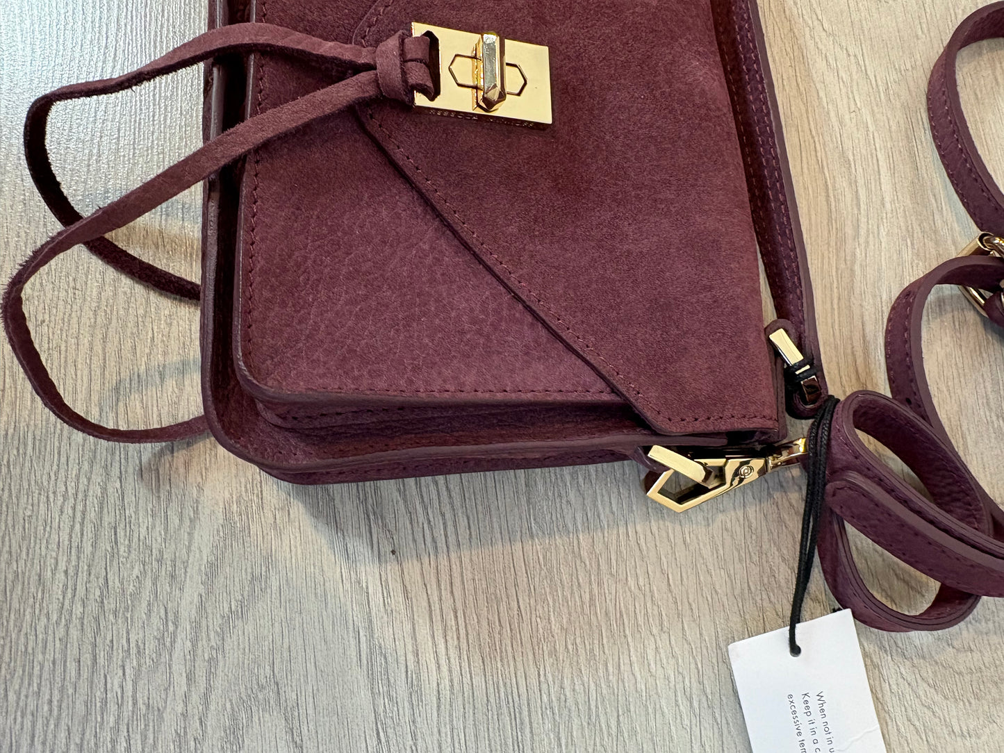 REBECCA MINKOFF. Bolso mini piel berenjena