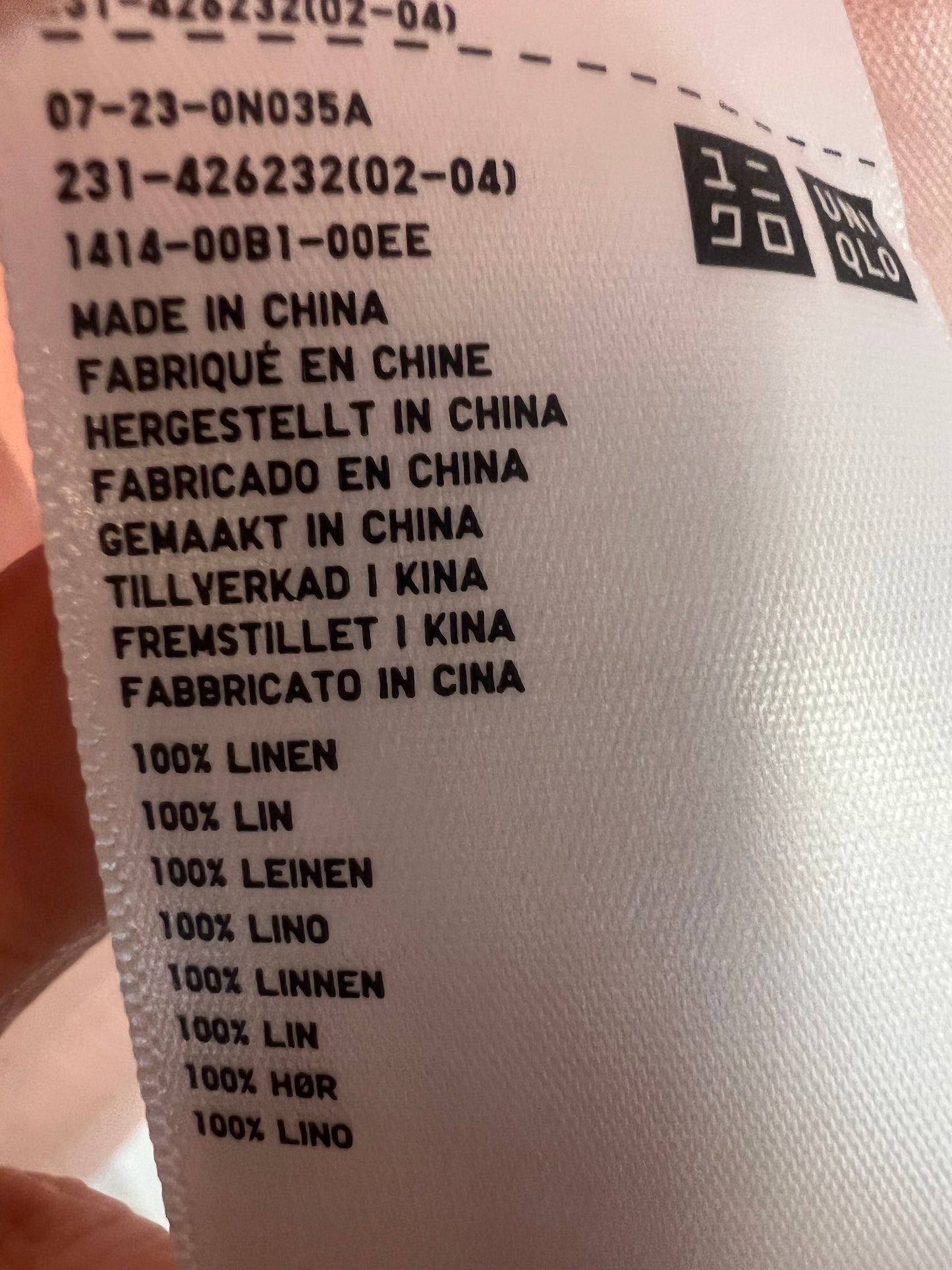 UNIQLO. Light pink linen blouse. T.S.