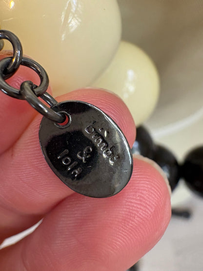 BIMBA Y LOLA. Collar largo bicolor formas