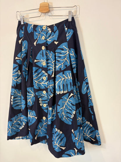 TOAST . Falda midi estampada bolsillos