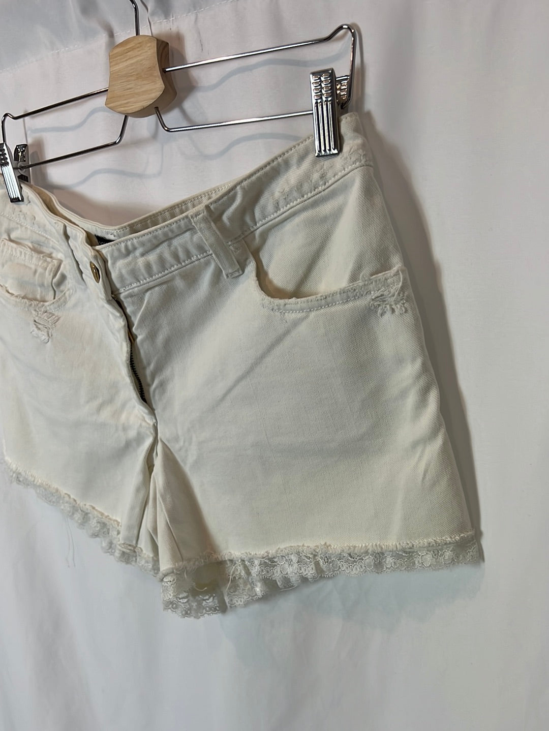 DOLCE&amp;GABBANA. White denim shorts with lace detail. Size 40
