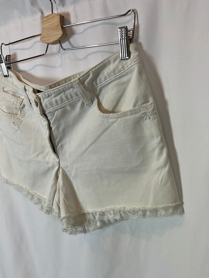 DOLCE&amp;GABBANA. White denim shorts with lace detail. Size 40