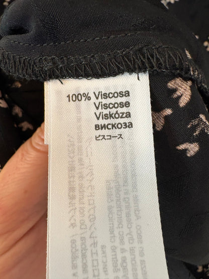 YERSE. Falda midi negra estampada asimétrica