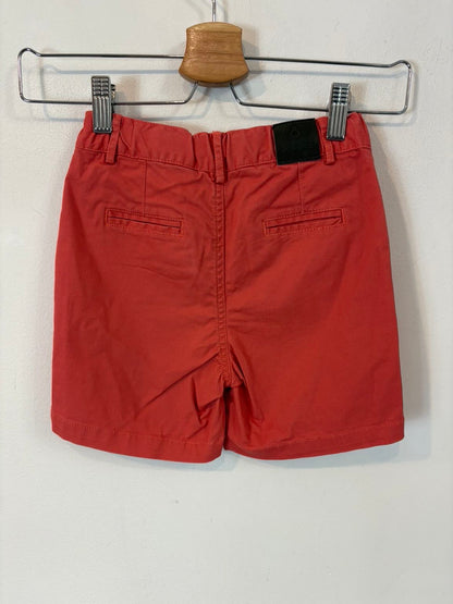 BONNET A POMPON. Bermuda roja T. 5 años