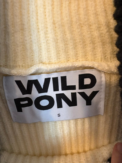 WILD PONY. Jersey bicolor cuello vuelto
