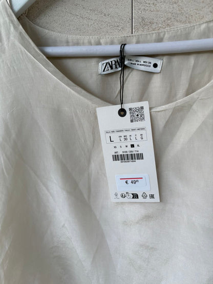 ZARA. Vestido midi color crudo texturas