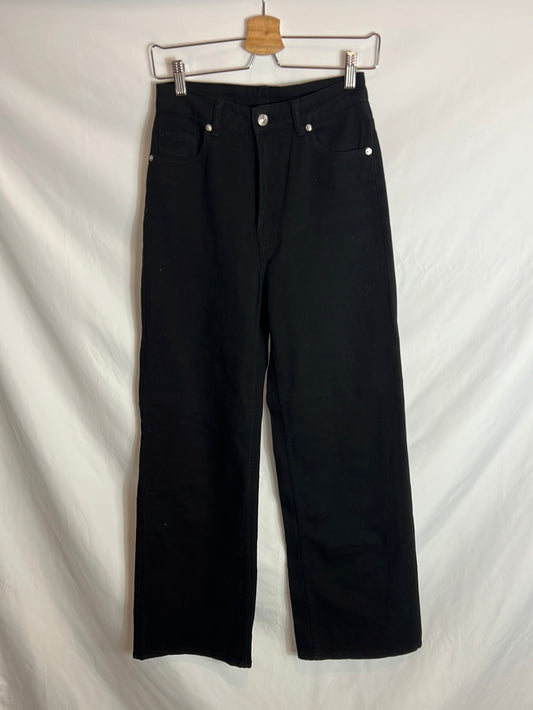 H&M. Denim pata ancha negro. T 36