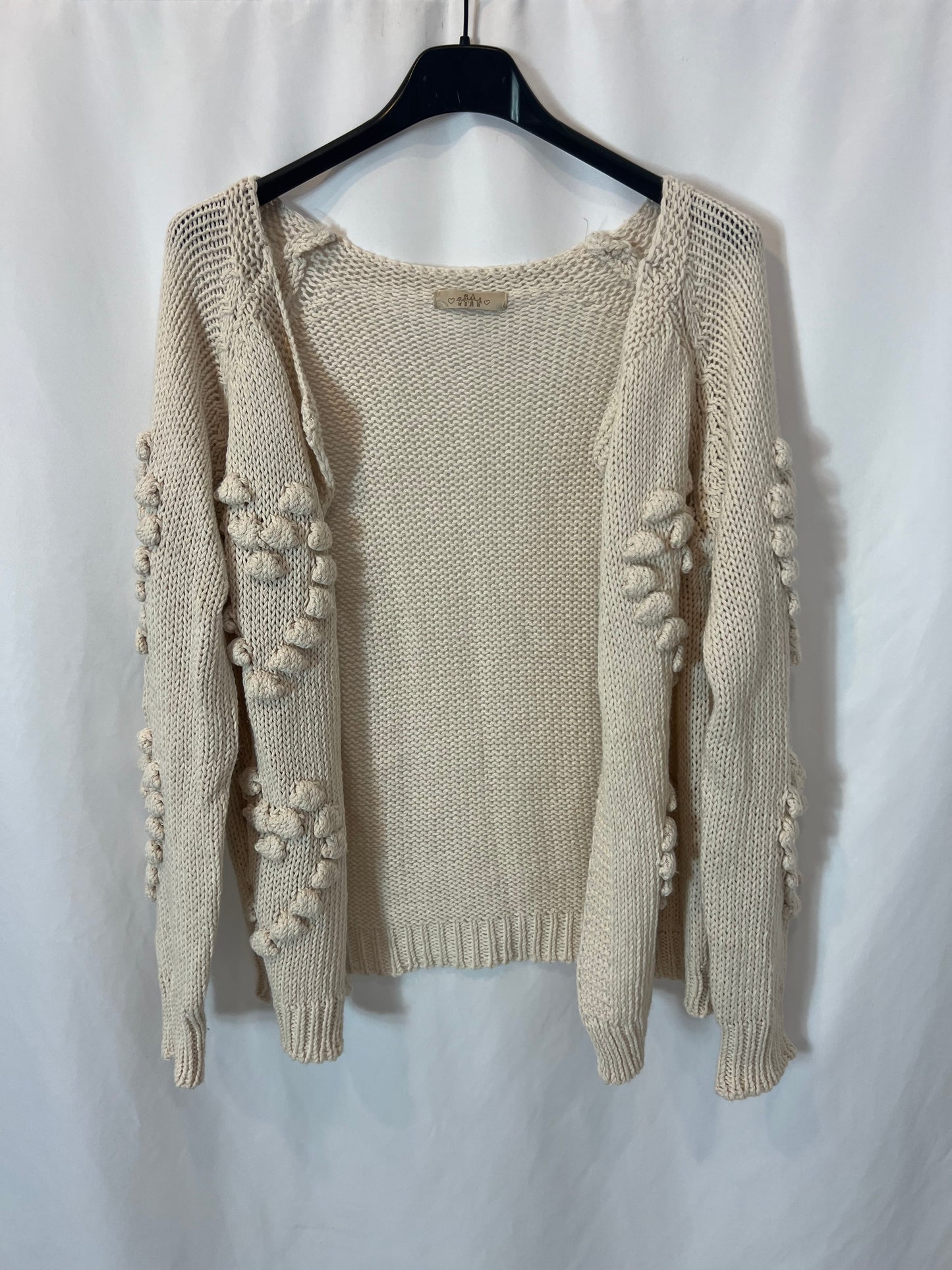 OTRAS. Cárdigan beige bodoques. T M