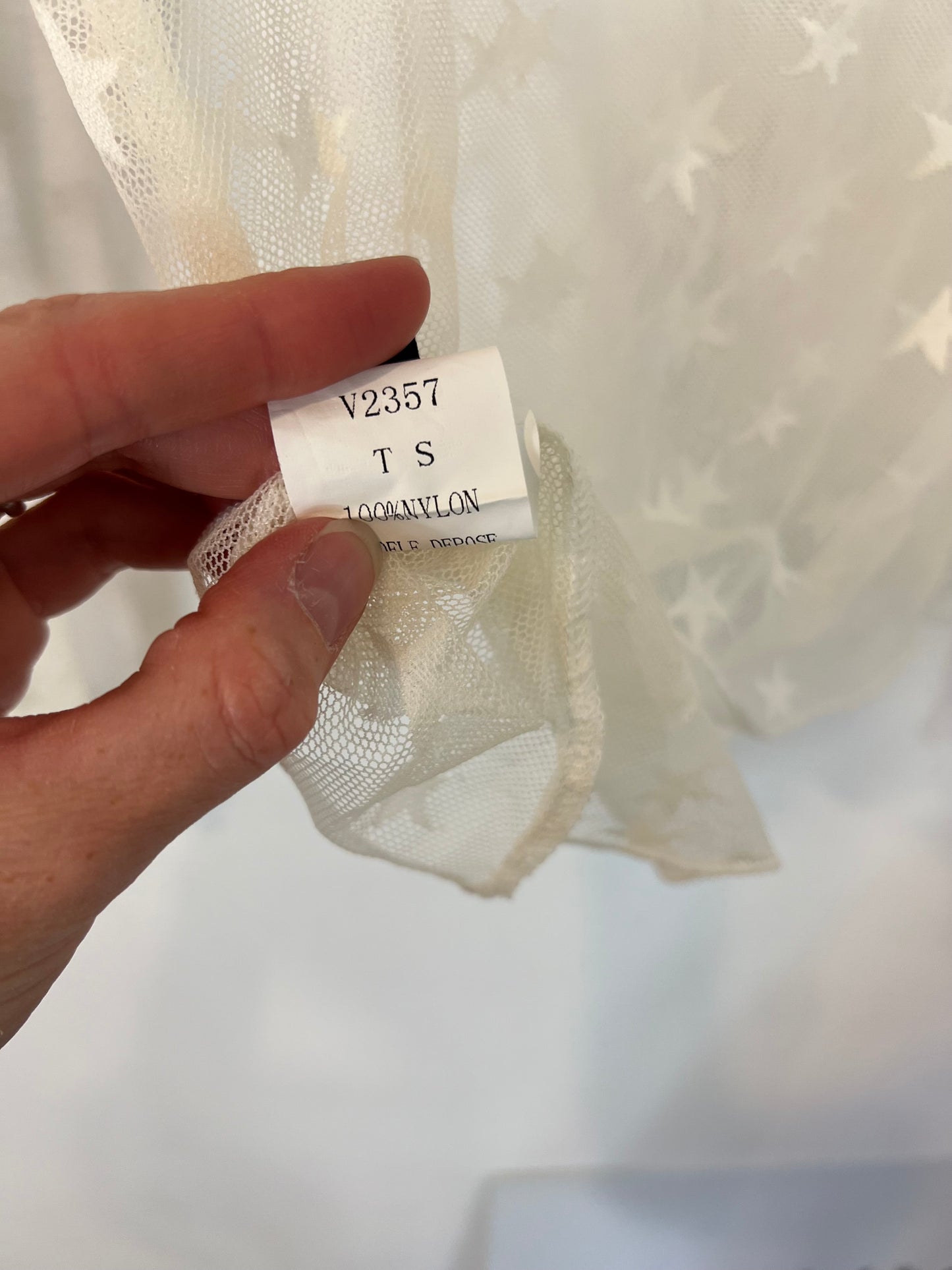 IN VOGUE.Top rejilla estrellas T.s