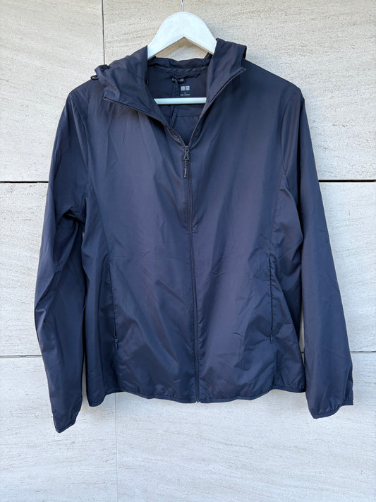 UNIQLO. Navy blue pocketable windbreaker. TL