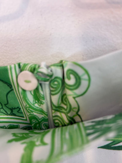 SILVIA TCHERASSI. Falda midi estampado verde.asimétrica. T S