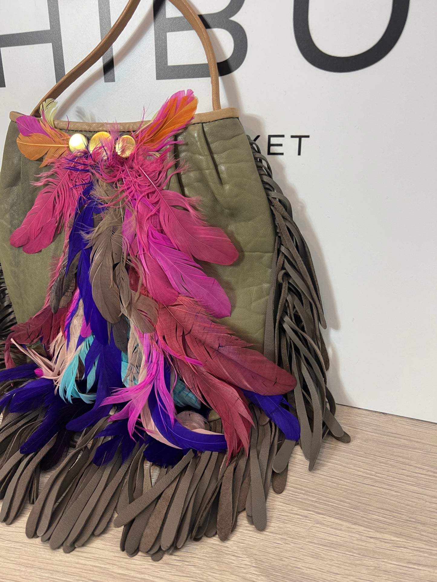 INTROPIA. Bolso piel plumas y flecos