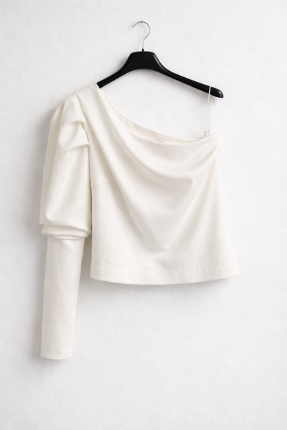 OTHERS. White asymmetrical top with puffed sleeves. TM