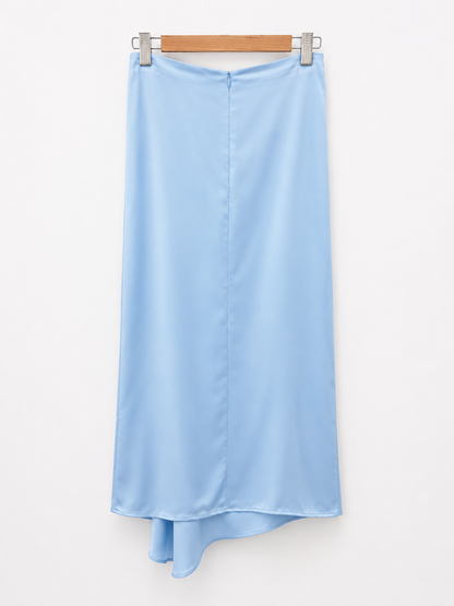 BY CLÉA. Falda midi azul volante (36,38,40)
