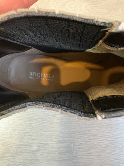 MICHAEL KORS. Botines piel snake print