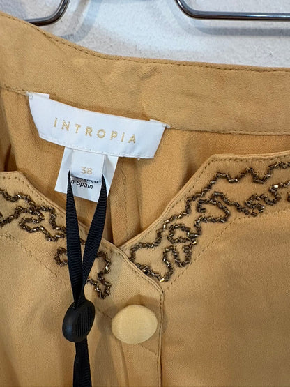 INTROPIA. Pantalón fluido cropped abalorios
