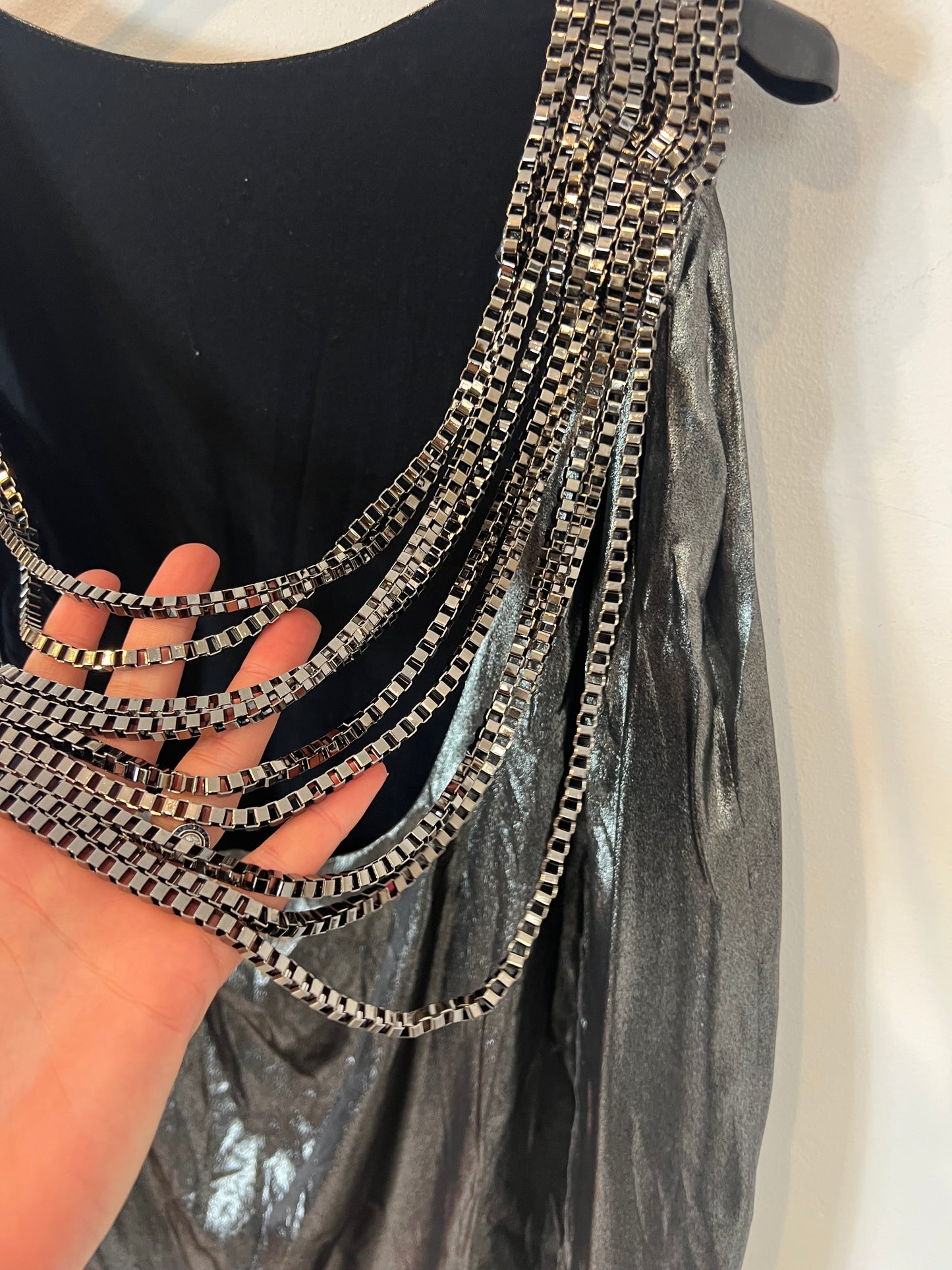 ELLA LUNA. Metallic silk top with chain detail on the back. TS