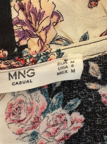 MANGO. Blusa estampada cuello pico