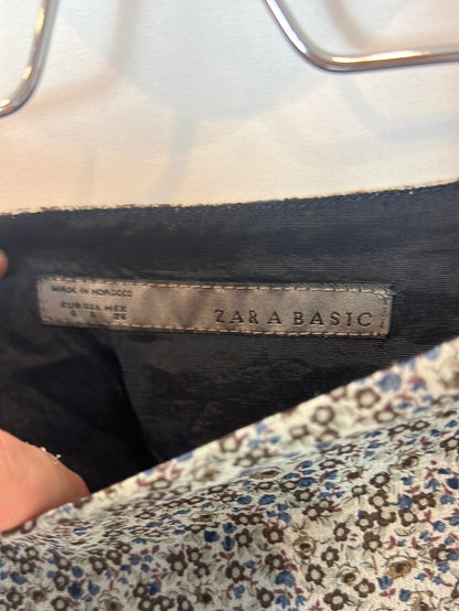 ZARA. Falda corta volantes T.s