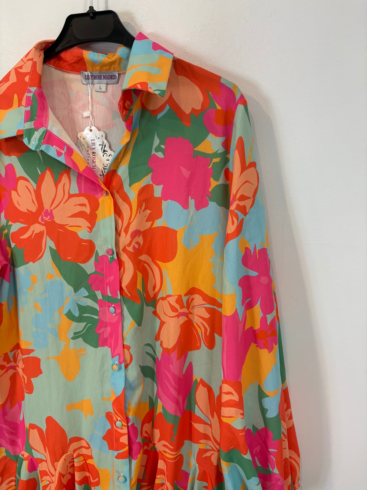 LILY ROSE. Vestido vuelo fucsias. T L