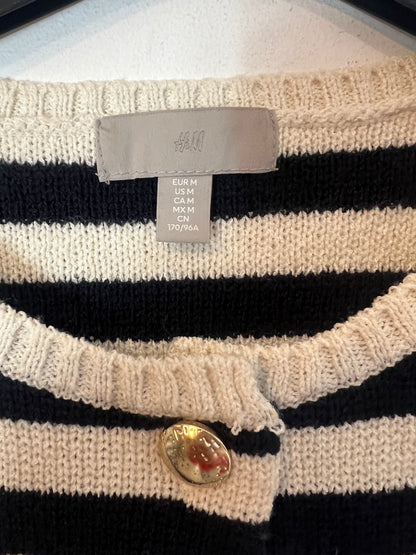 H&M. Top abotonado rayas. T M