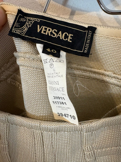 VERSACE. Falda elástica volante