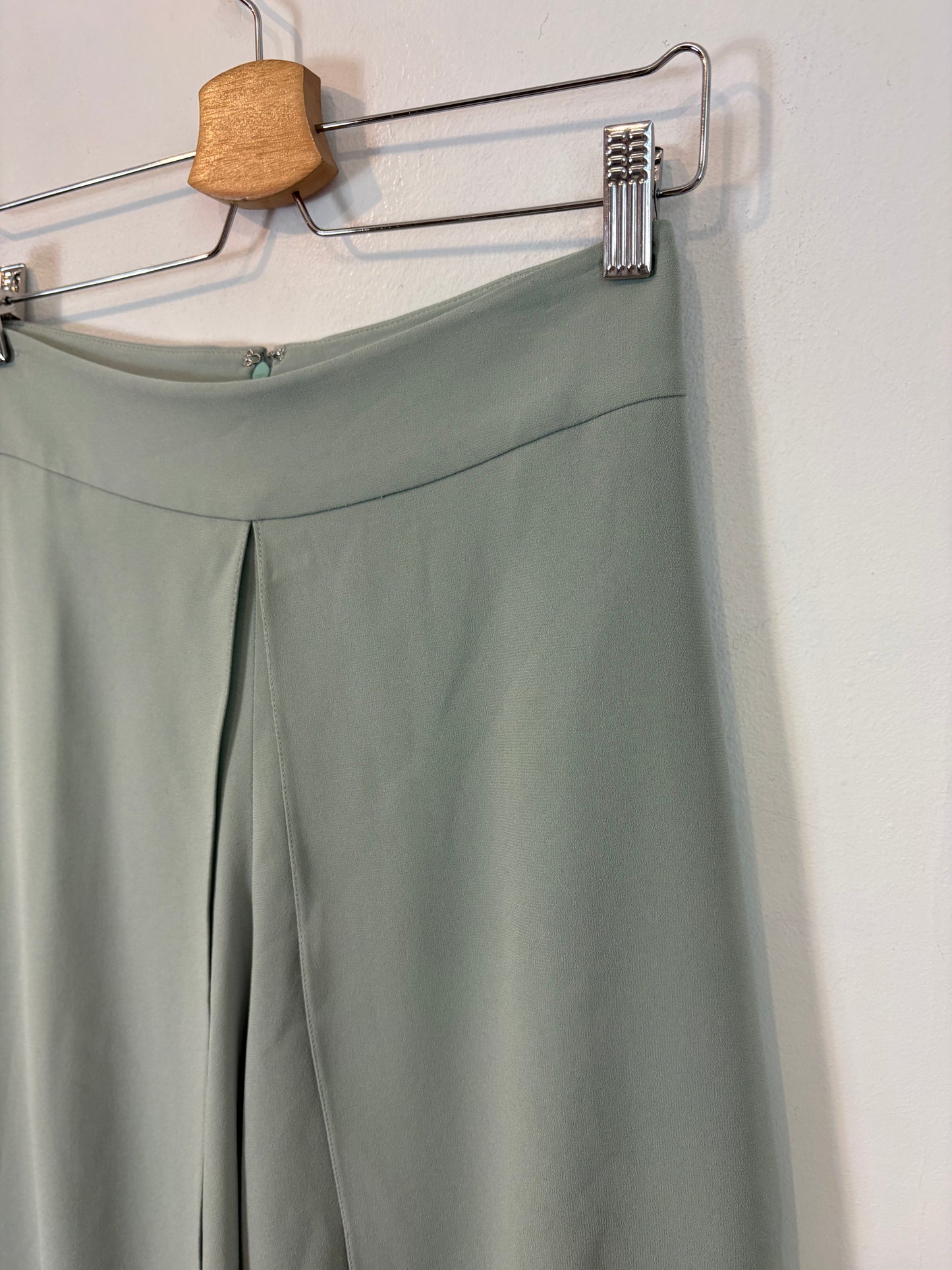 ROBERTO TORRETTA. Green trousers with slits. Size 36