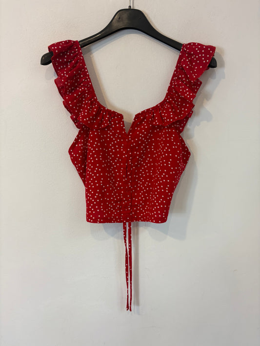 Top rojo lunares y volantes