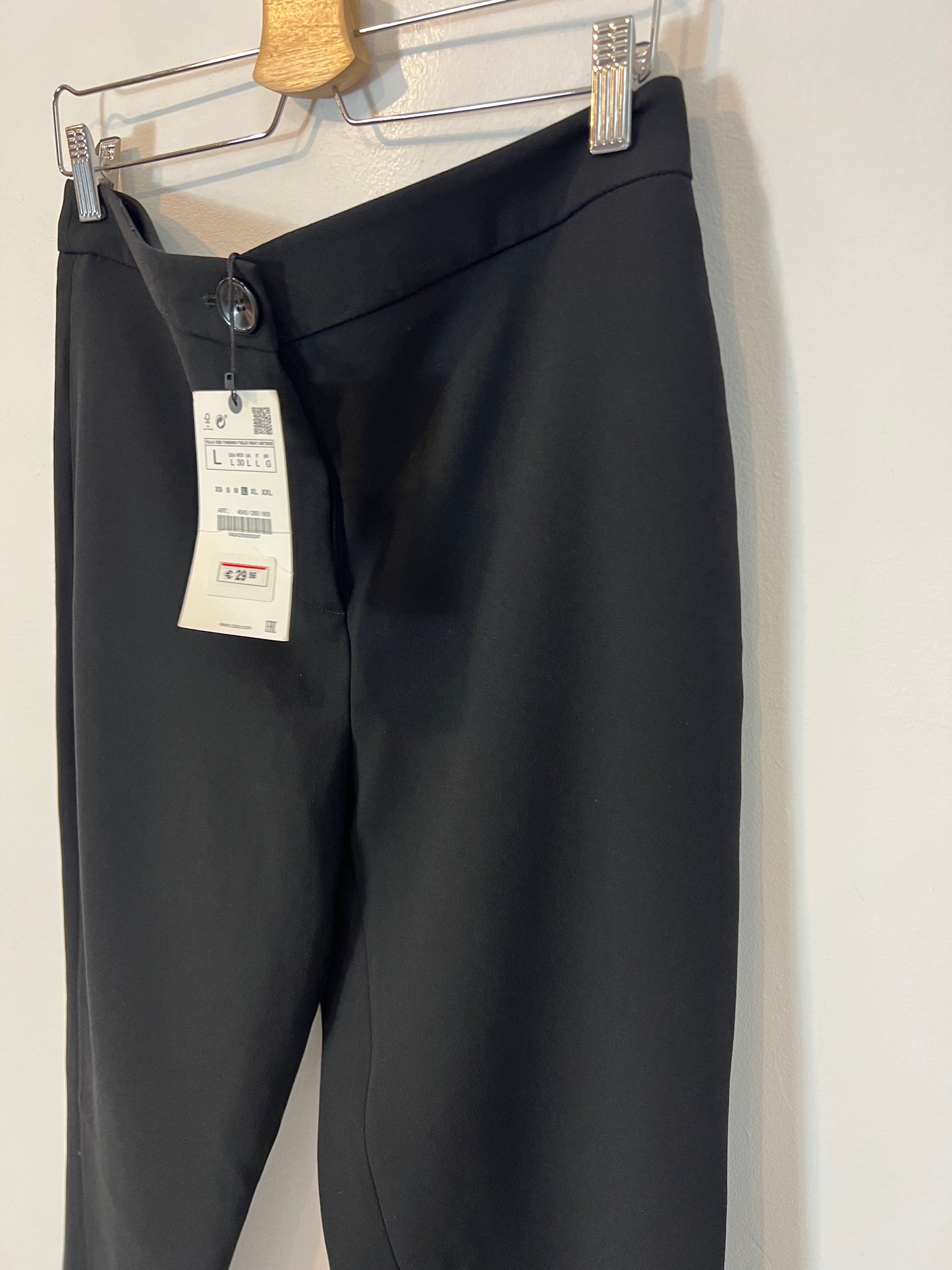 ZARA. Pantalones negros aberturas. T L