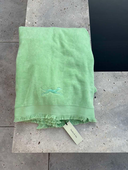 BIMBA Y LOLA. Toalla de playa verde lima logo
