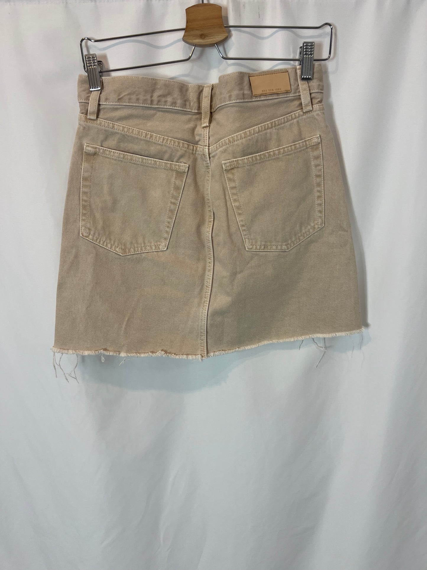 MANGO. Short beige buttoned denim skirt. TM