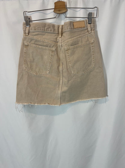 MANGO. Short beige buttoned denim skirt. TM