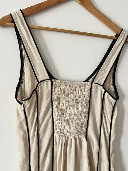 Vestido largo beige detalles negros