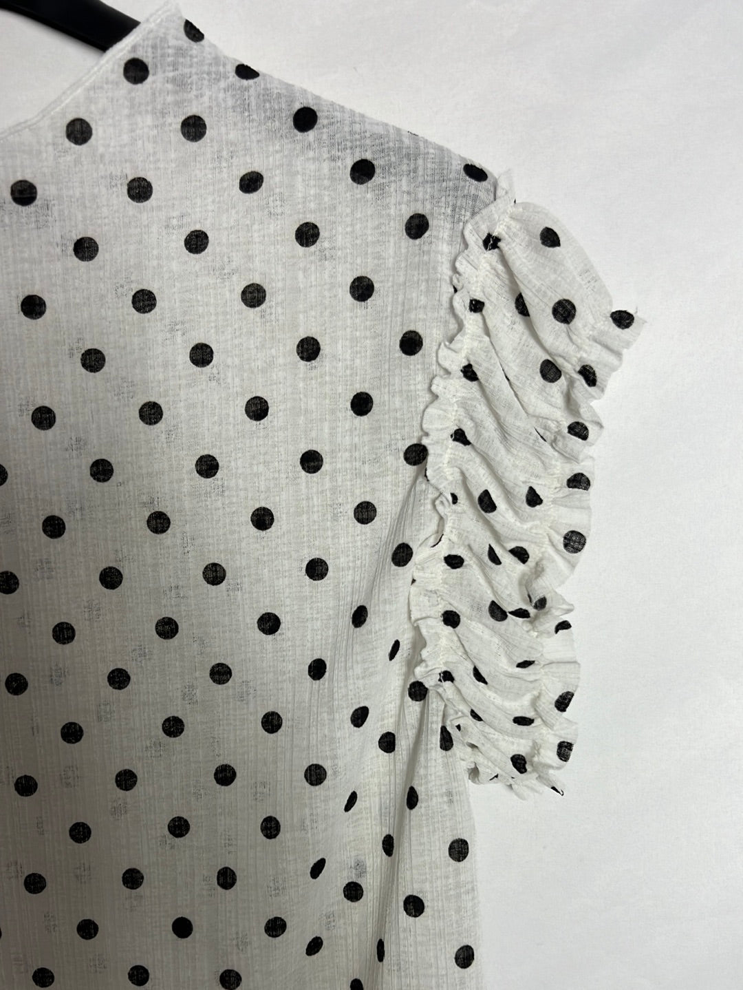 SFERA. Semi-sheer white polka dot top. TS