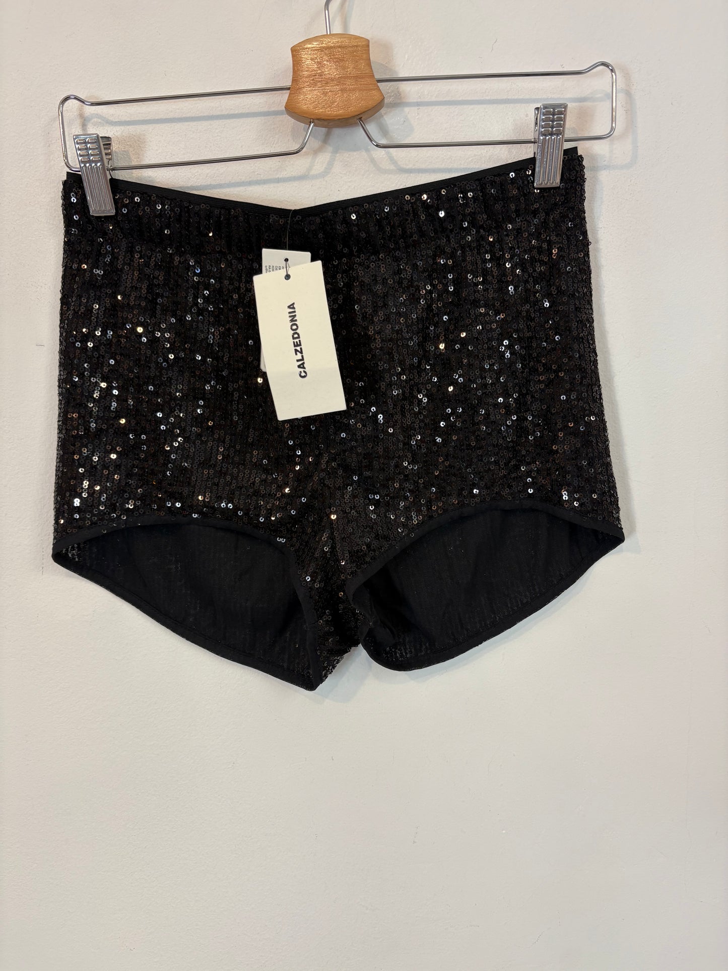 CALZEDONIA. Pantalón corto lentejuelas. T M/L