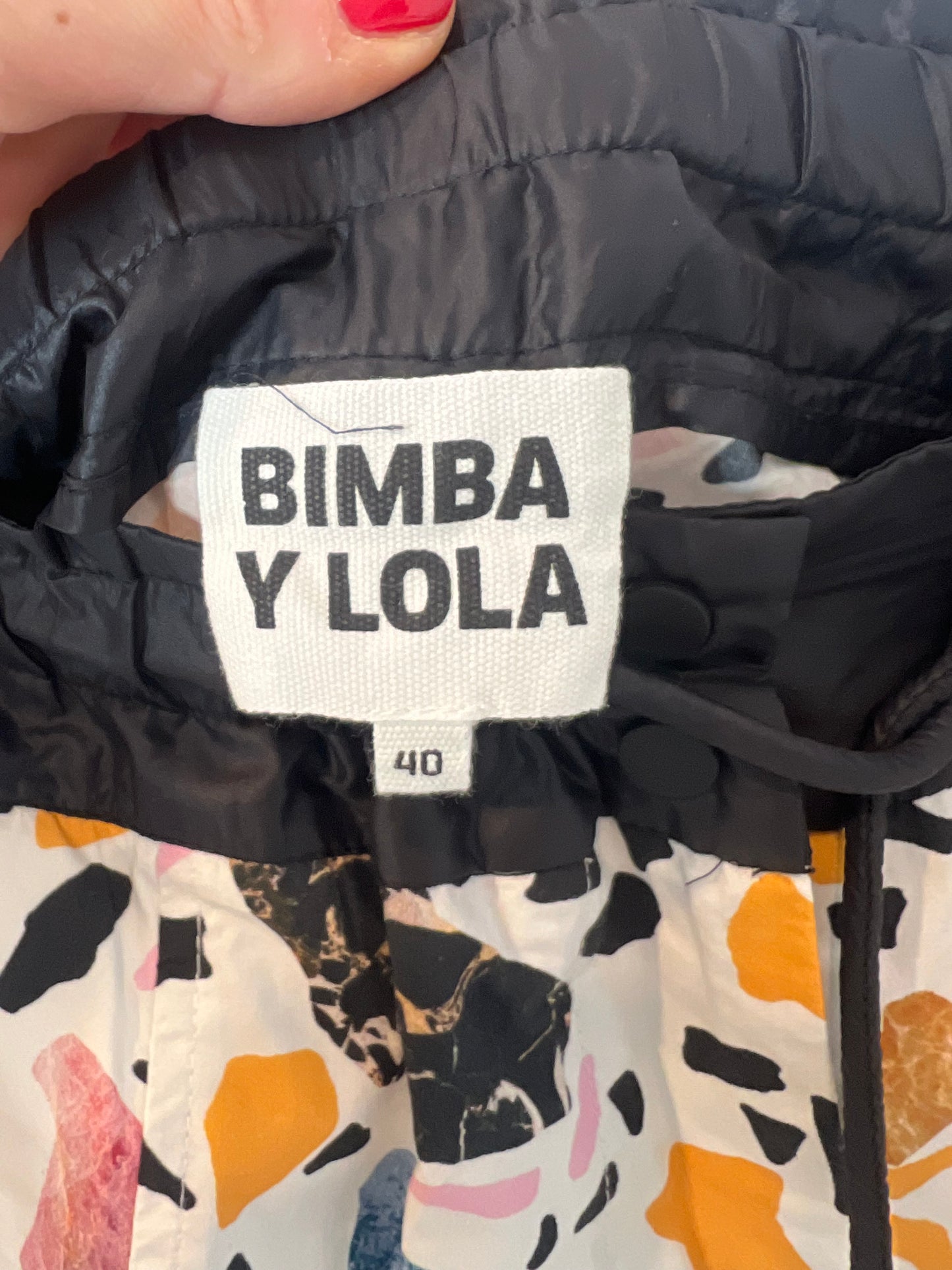 BIMBA Y LOLA. Textured print trousers. Size 40