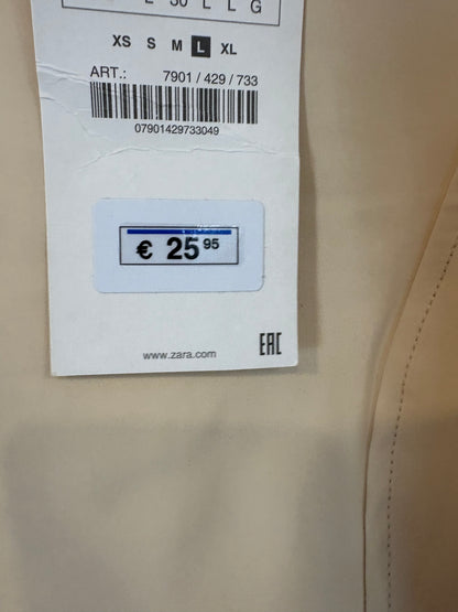 ZARA. Body color crema detalle espalda. T L