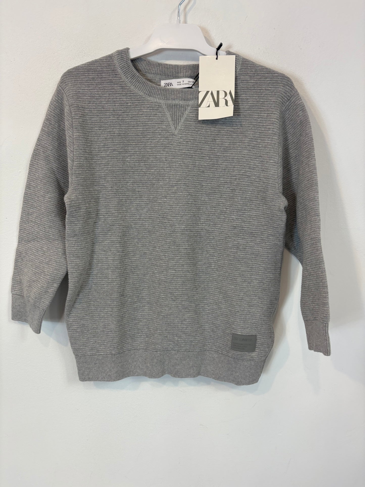 ZARA. Jersey gris textura. T 7 años