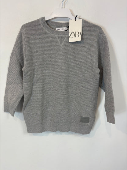 ZARA. Jersey gris textura. T 7 años